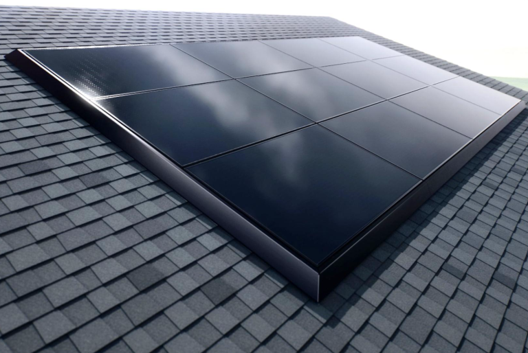 Low-profile Tesla Solar Panels installed on a residential shingle roof